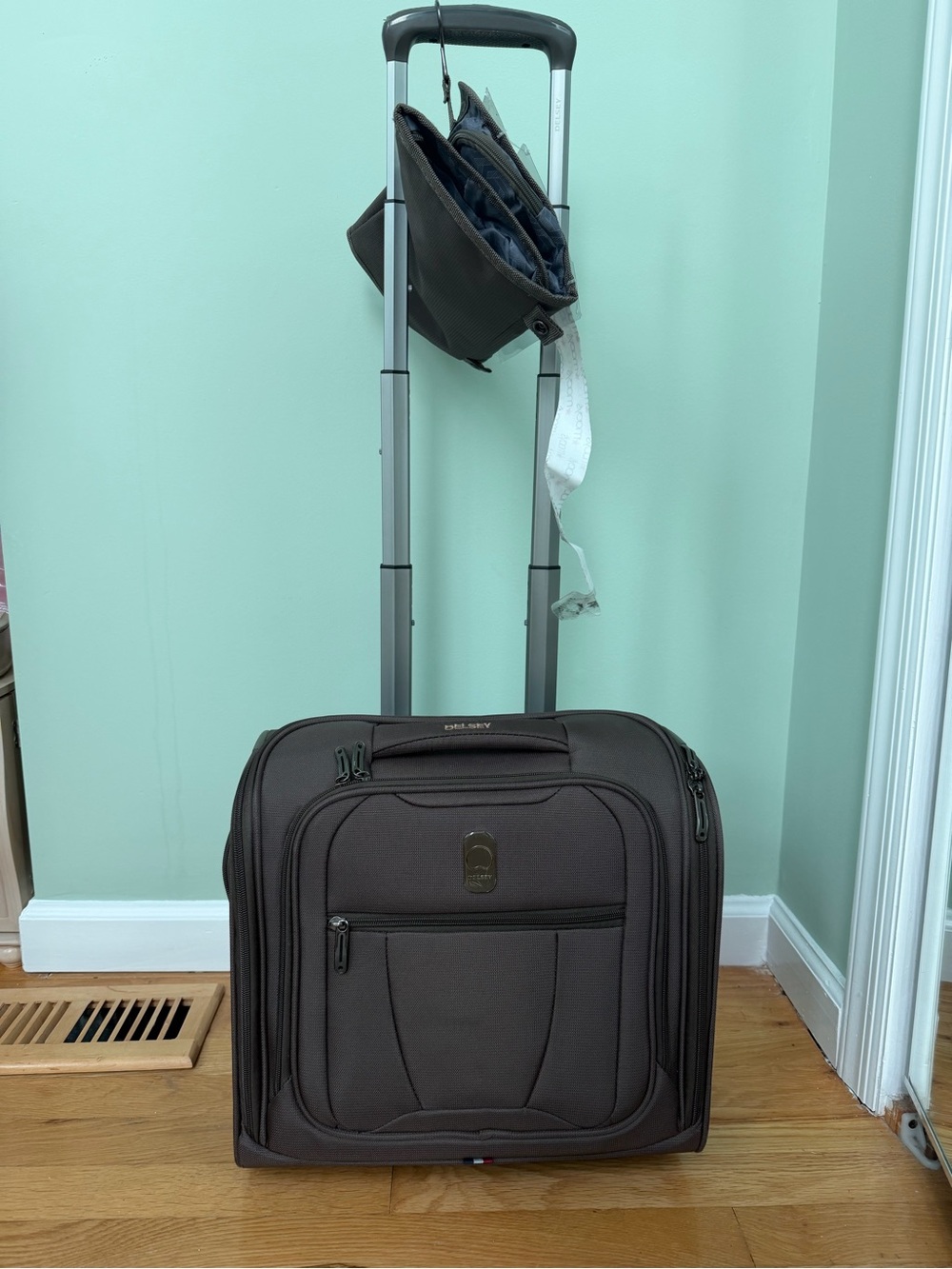 Brown Rolling Carry-On under seat luggage